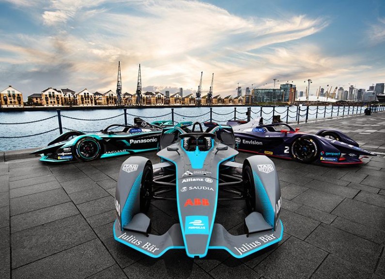 A trio of fully electric cars lined up in formation outside ExCeL London   the scene of Formula E s racing return to the UK capital in season six v2